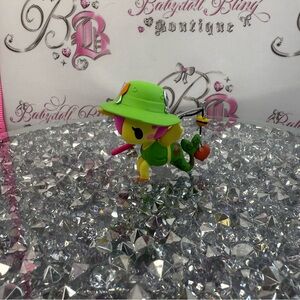 Tokidoki Character With Green Safari Fish Hat And A Fishing Pole